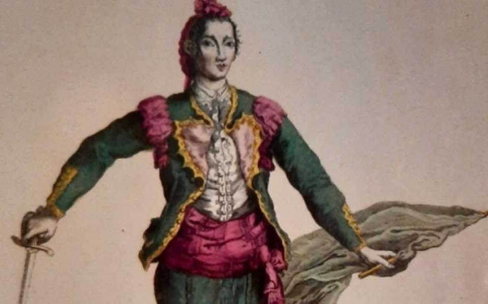 naipes sobre el traje de luces